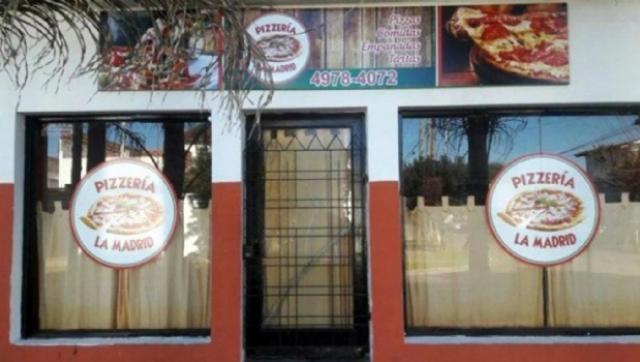 La barbarie total: entró armado a robar en una pizzería; ausente la Policía, comensales lo redujeron y casi lo linchan